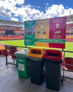 Three bins at Suncorp Stadium that allow for containers to be recycled.