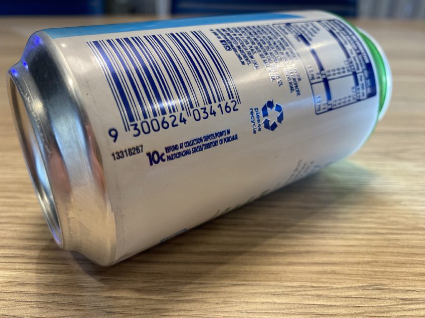 Aluminium beverage can showing barcode, recycling symbol and container deposit refund marking.